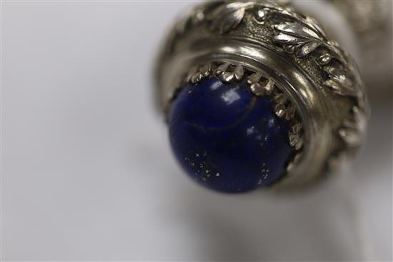 A 19th century French? white metal and lapis lazuli mounted rock crystal? scent bottle and glass stopper, gross weight 58.8 grams.